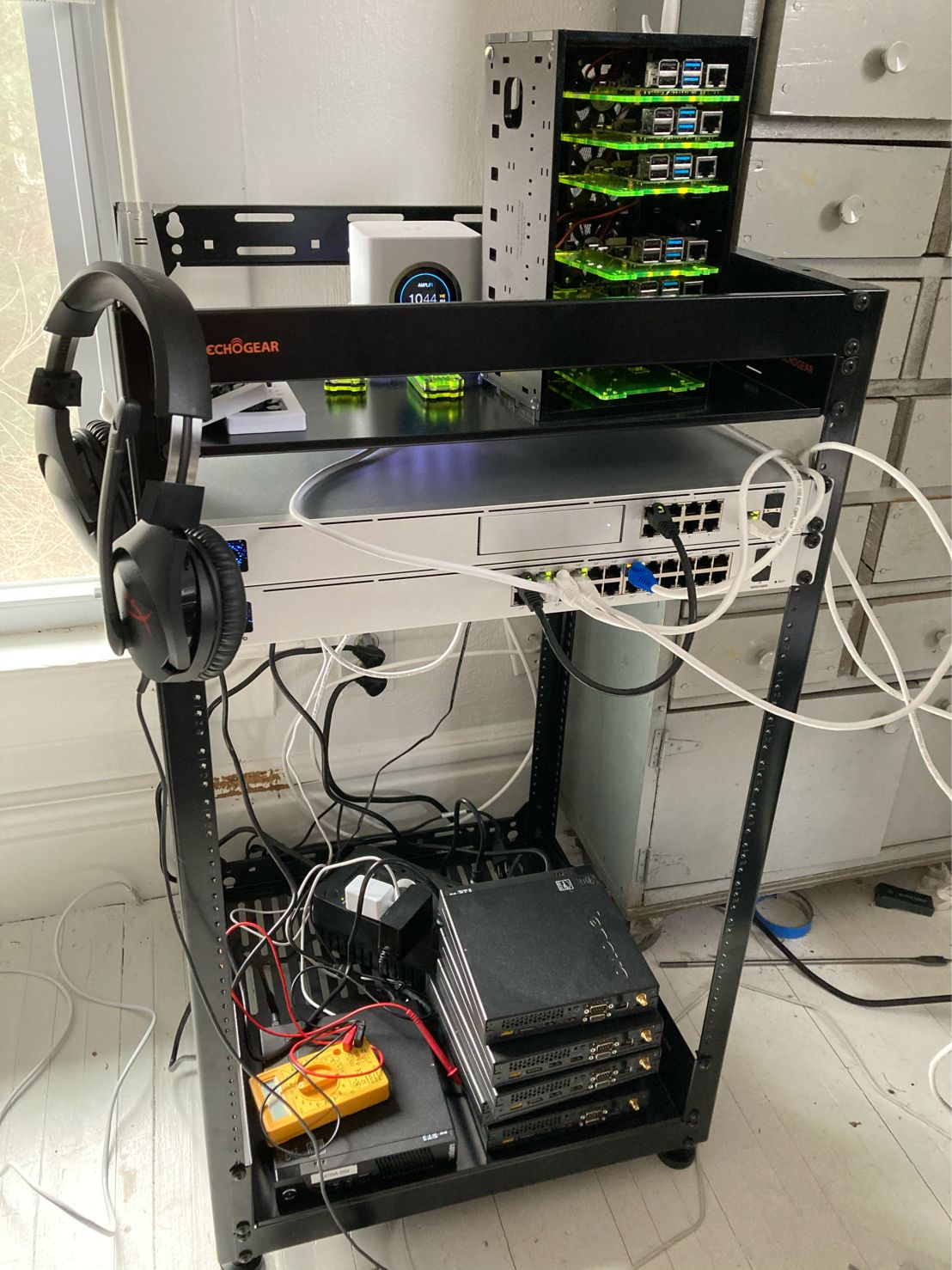 home lab open rack with new Unifi equipment